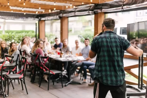 man speaking to an audience