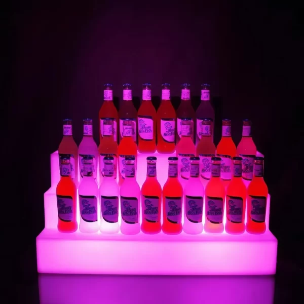 pink glow bottle shelf with many drinks on display